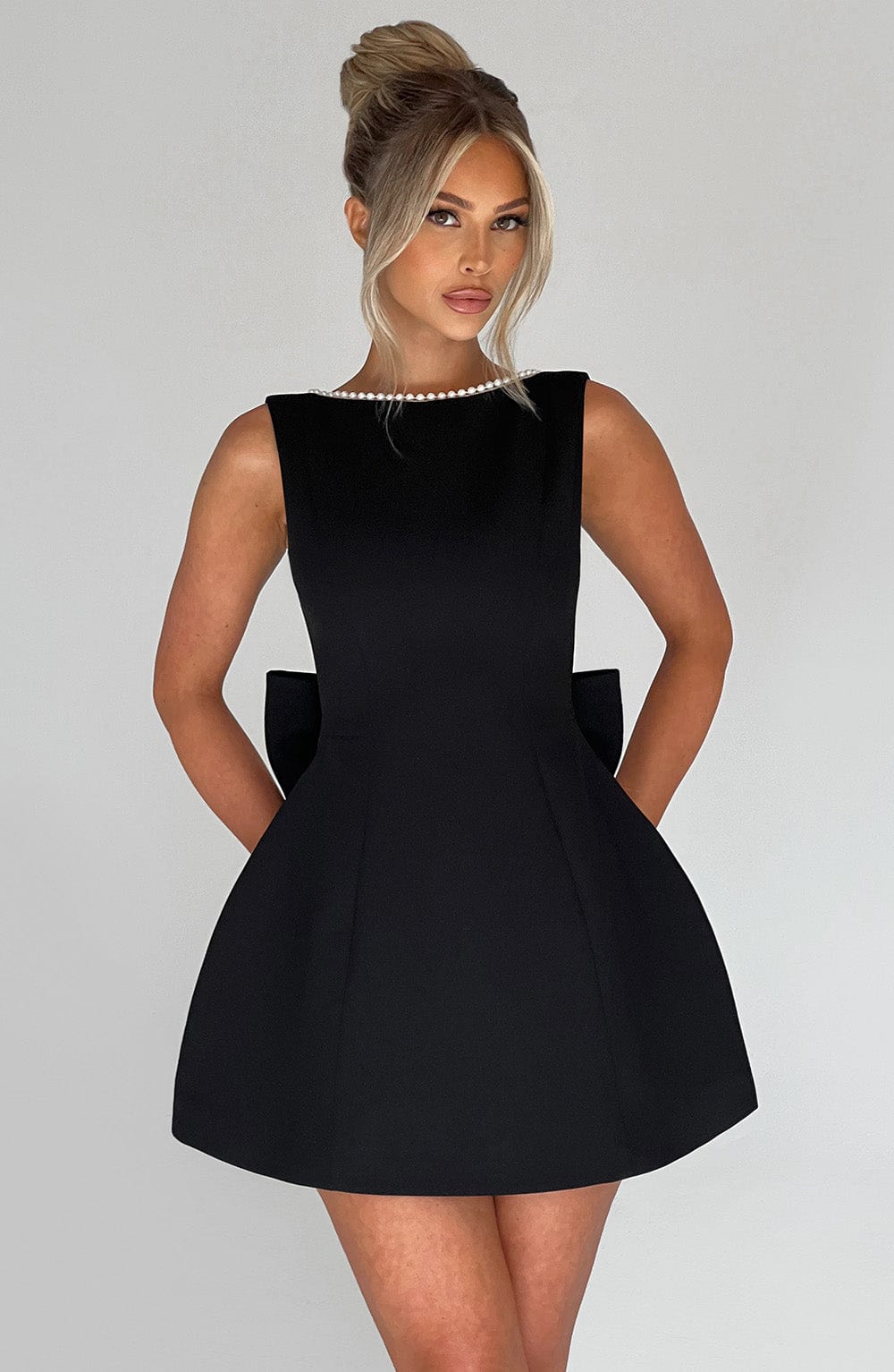 Fitted A-line mini homecoming dress for women, featuring exquisite pearl trim for a formal look.
