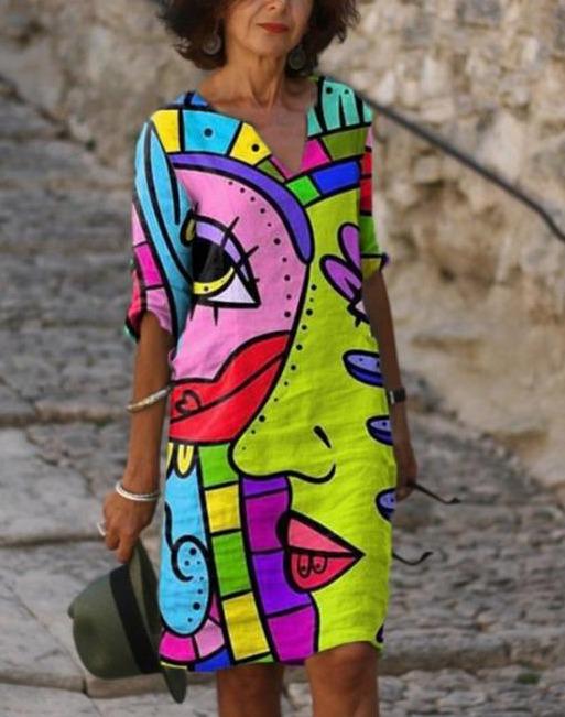 Women's abstract art print V-neck midi dress with a colorful, unique design. Perfect for statement casual or summer holiday style.