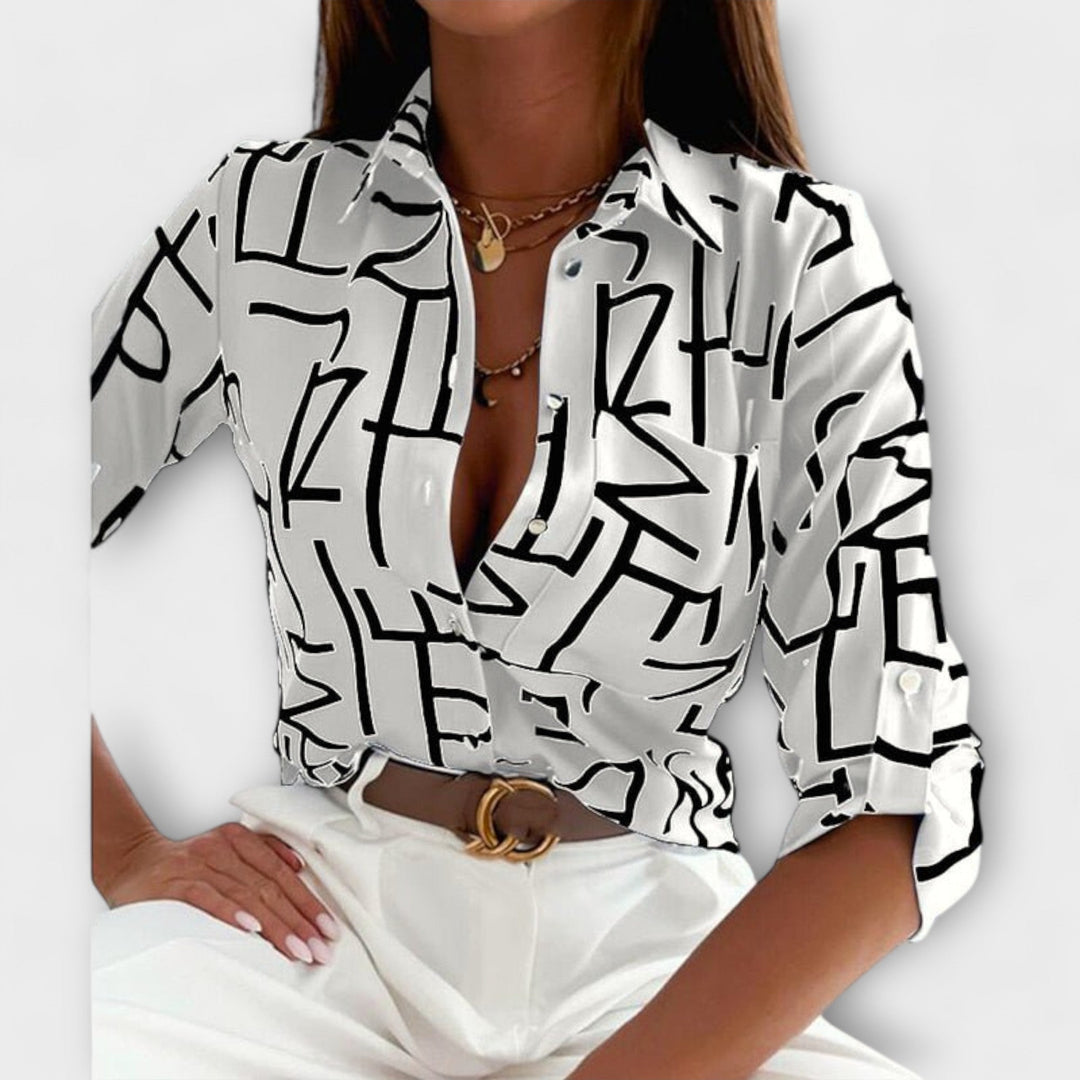 Comfortable women's abstract print blouse, stylish long sleeve button down for daily wear.