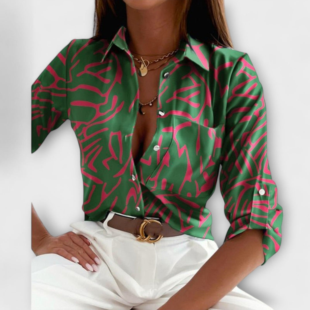 Stylish long sleeve women's blouse with unique abstract print, perfect for smart casual wear.