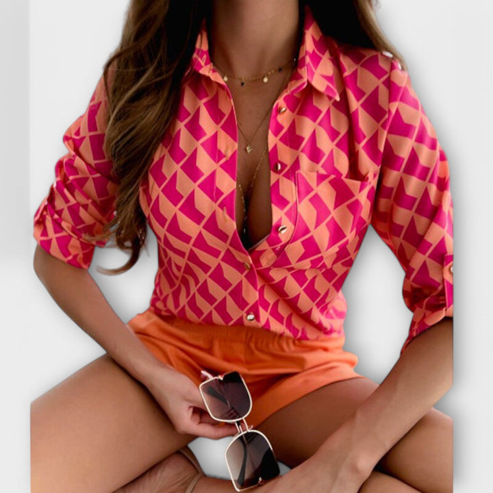 Versatile women's abstract print blouse, ideal for casual chic or smart casual outfits.