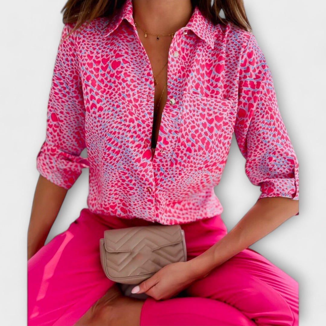 Effortless chic women's blouse, abstract print & button down design for modern style.
