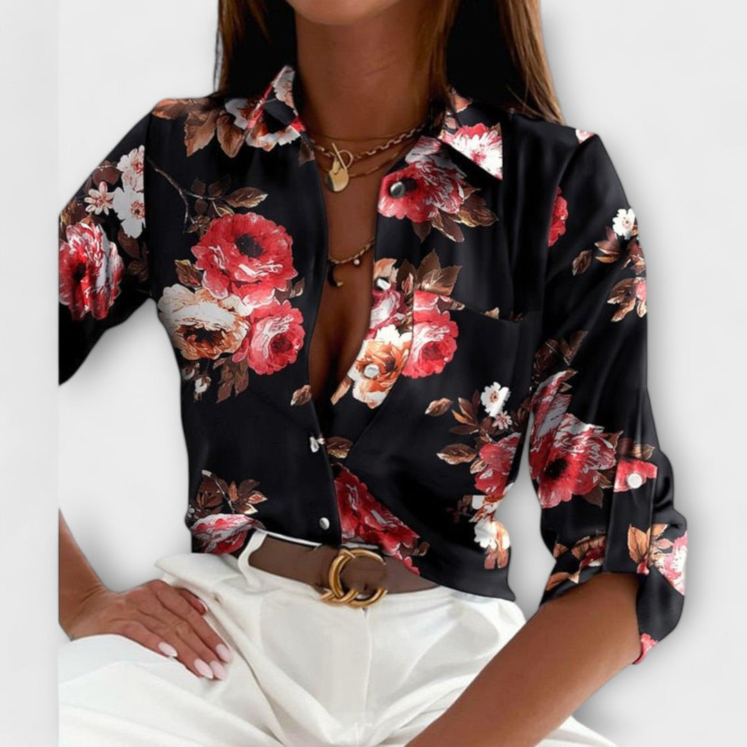Fashion-forward women's abstract print button down blouse, a true statement piece.
