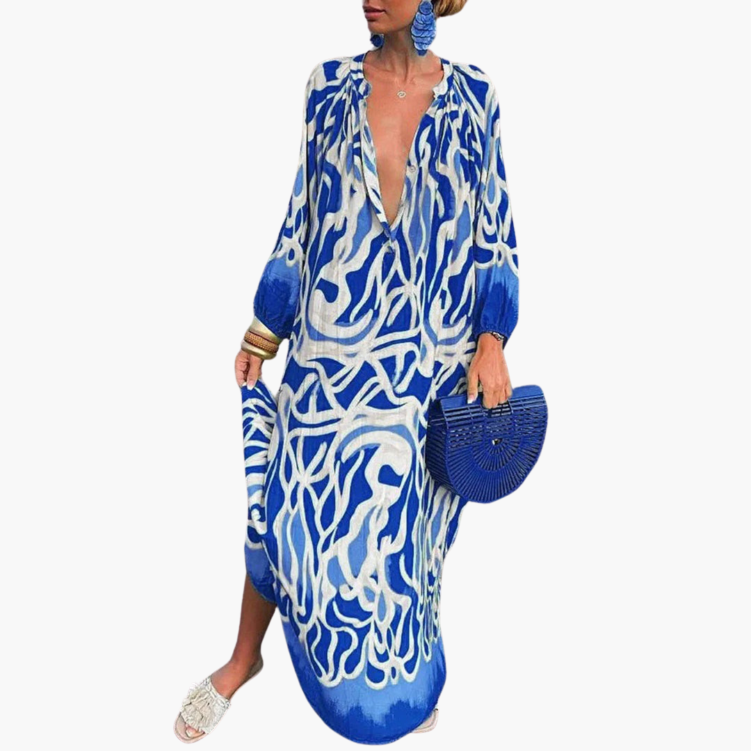 Relaxed women's oversized abstract print maxi dress with deep V-neck, essential for beach days & vacation.