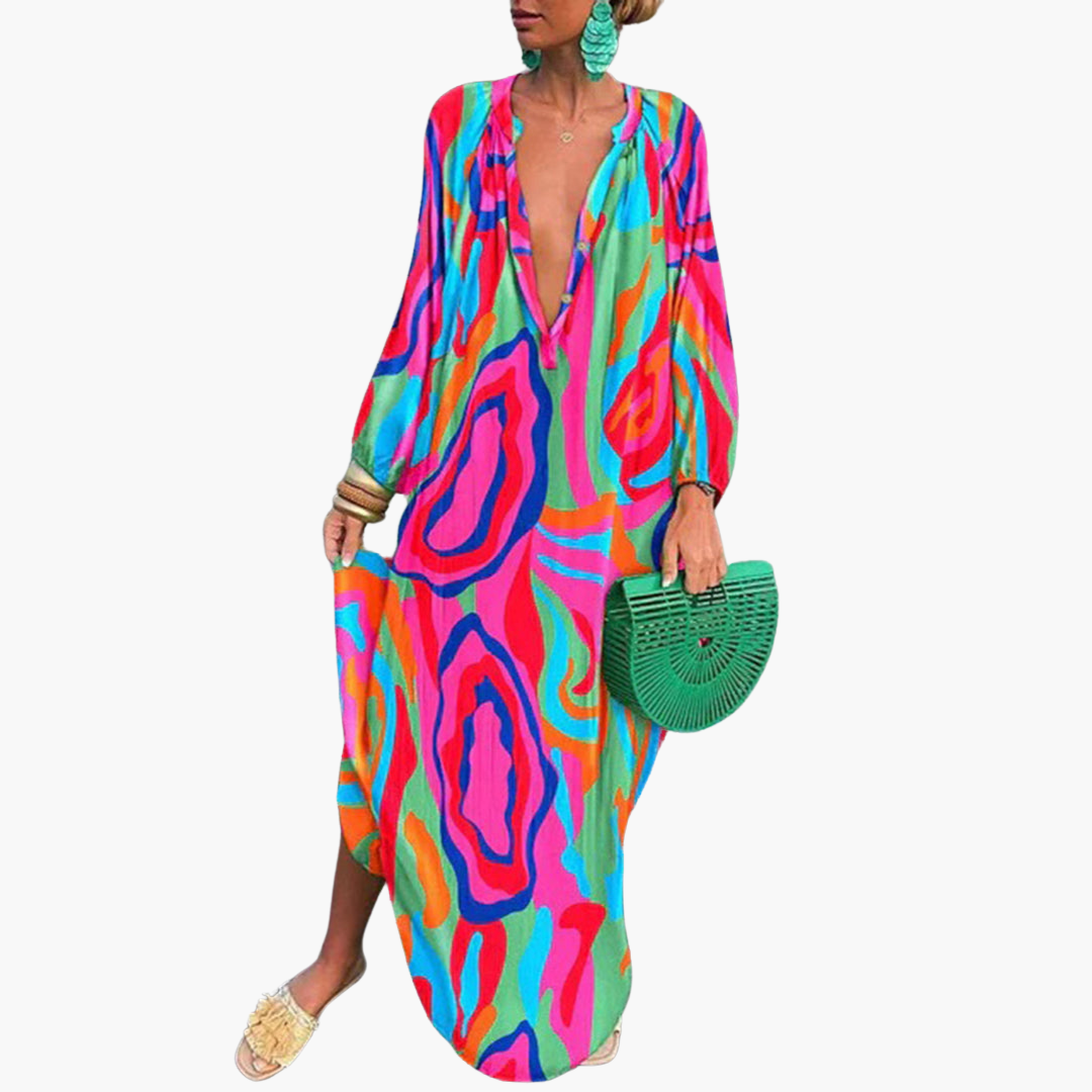 Women's abstract print deep V-neck oversized maxi dress. Flowy resort wear, perfect summer beach vacation outfit.