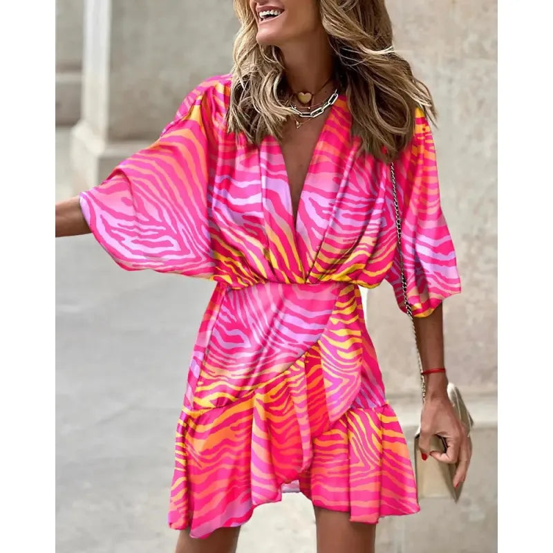 Women's abstract print ruffle mini dress with V-neck & wide sleeves, perfect for summer casual wear.