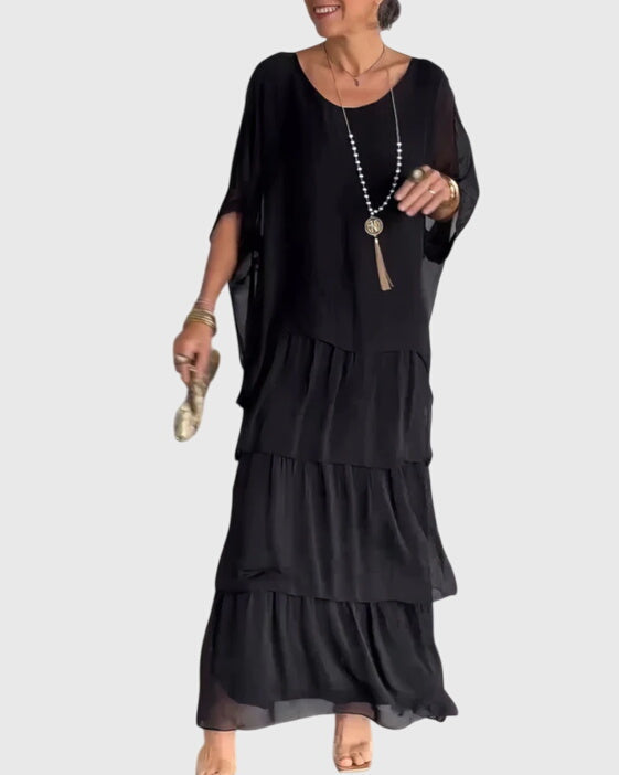 Women's elegant abstract print tiered dress, a must-have for vacation and comfortable spring/summer fashion.
