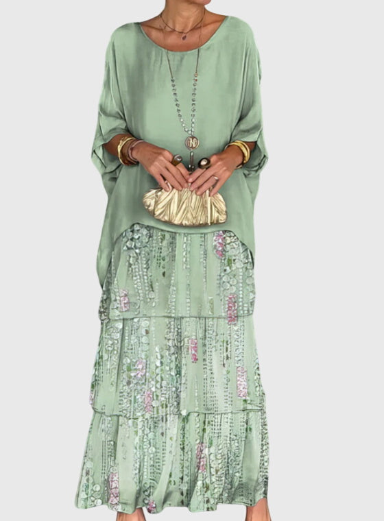 Chic women's boho dress, tiered with abstract print, creating a flattering silhouette for all body types.