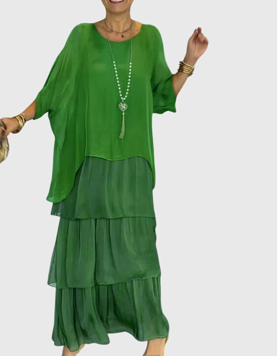 Casual women's summer maxi dress with abstract print, offering a loose and comfortable bohemian style.