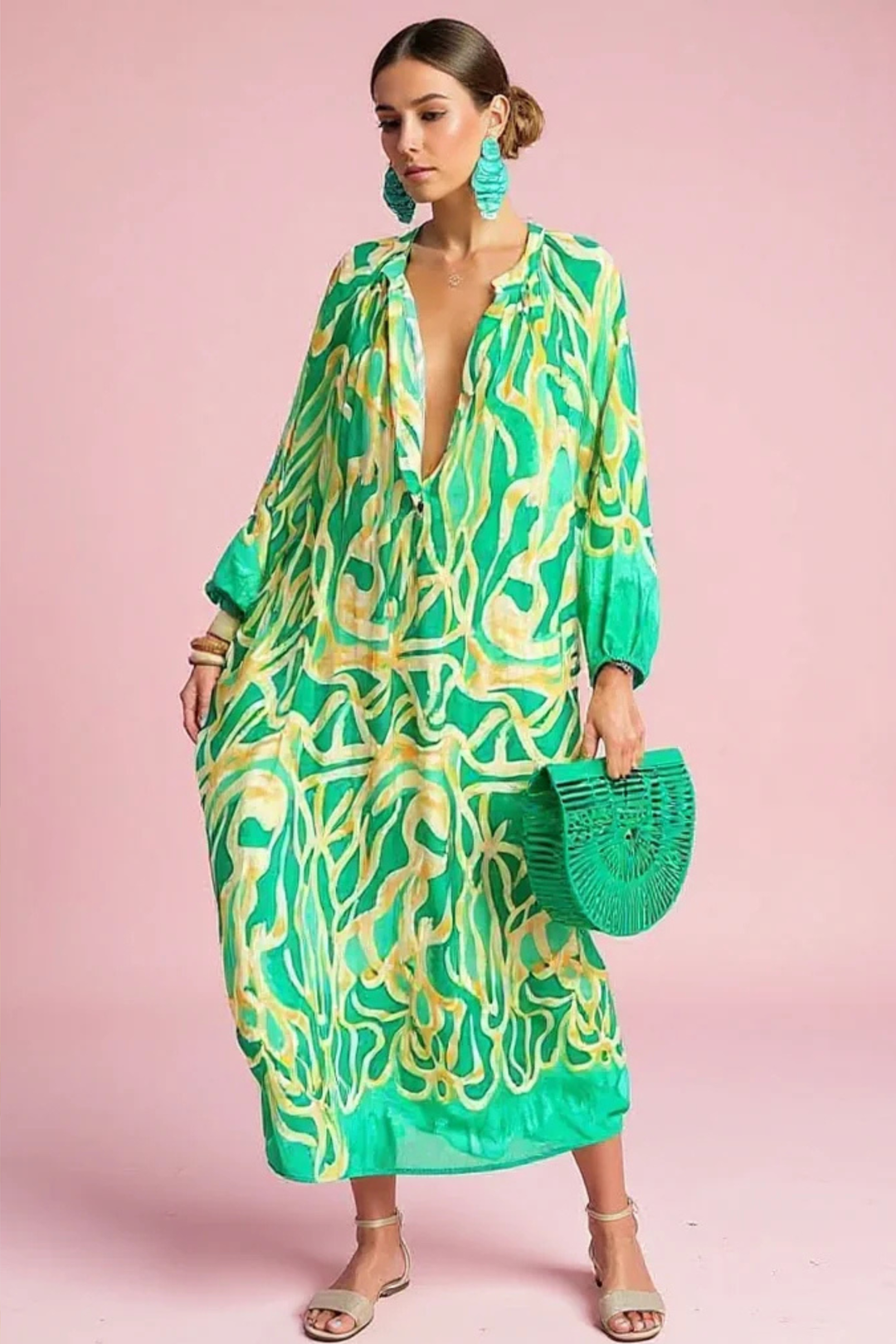 Women's abstract print V-neck kaftan maxi dress. Perfect for resort wear, beach, or summer vacation. Flowy & relaxed fit.