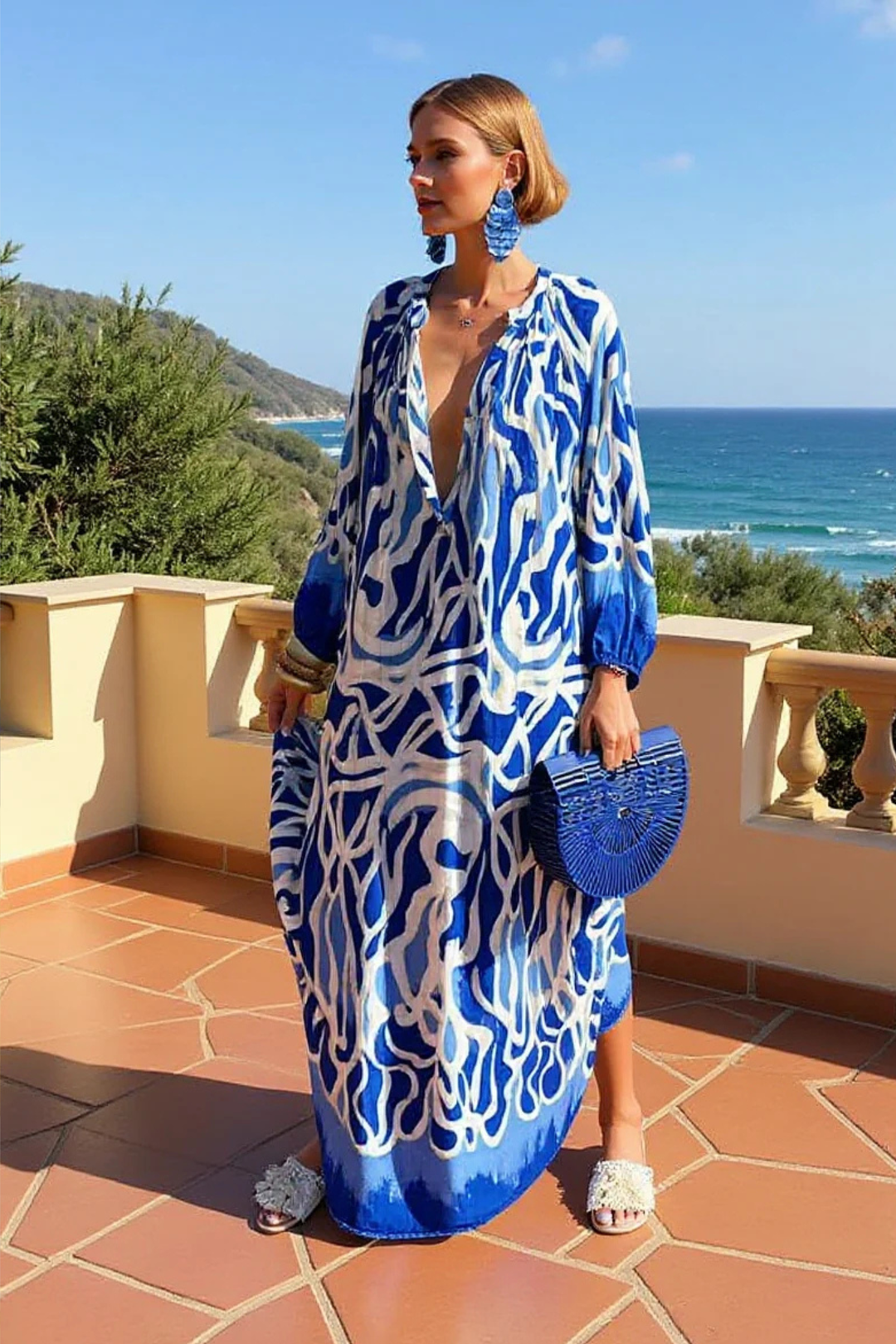 Flowy women's abstract print kaftan maxi dress with V-neck. A comfortable and chic choice for beach days & vacation outfits.