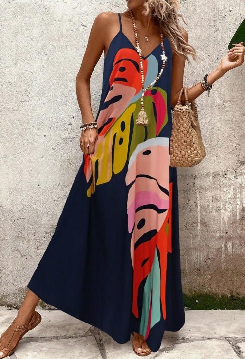 Vibrant abstract print women's maxi sundress. Stylish spaghetti strap V-neck dress, ideal for summer fashion.