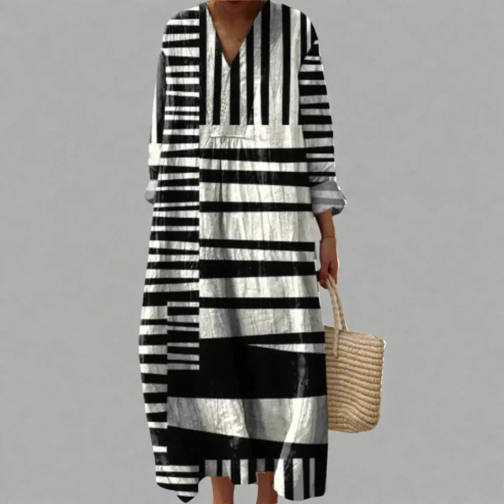 Women's Abstract Striped V-Neck Midi Dress, relaxed fit, versatile for casual or evening fashion.