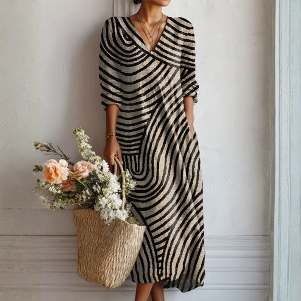 Women's abstract wave print V-neck long sleeve maxi dress. Stylish, flowy, and comfortable multicolor casual dress.