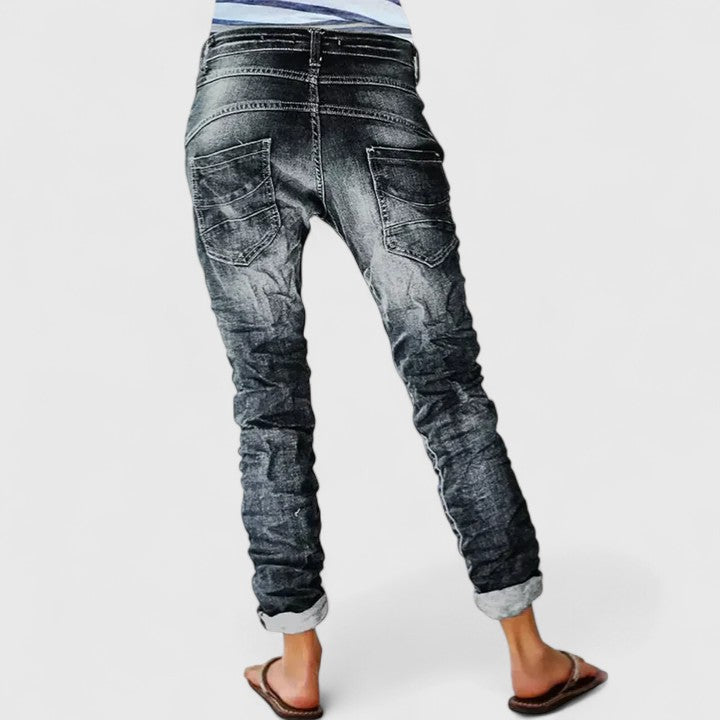 Women's acid wash skinny jeans with contrast stitching, a classic and trendy denim look.
