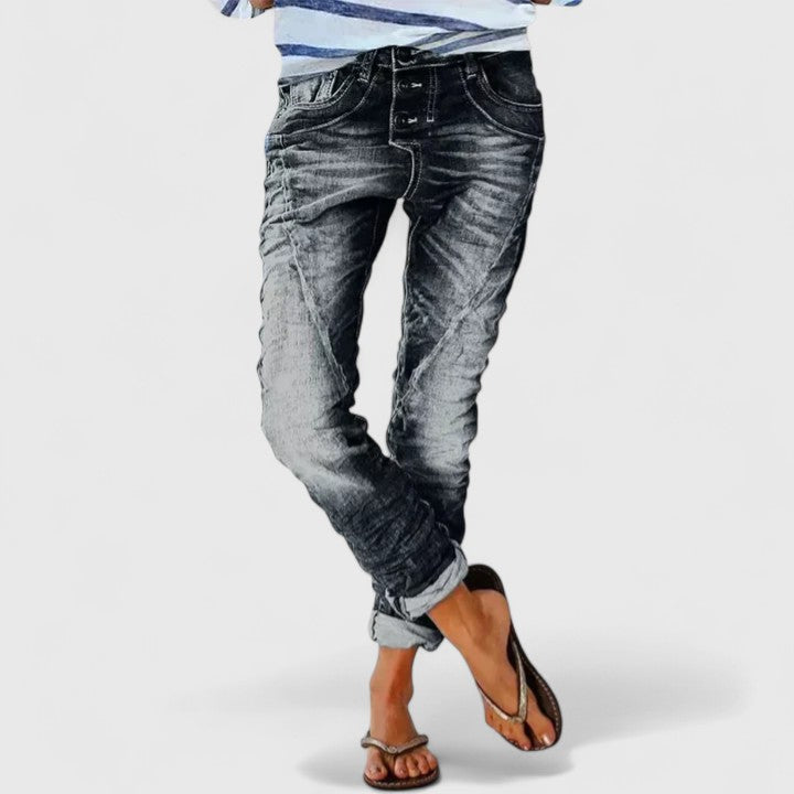 Women's fashion denim: acid wash skinny jeans, casual yet trendy, with standout contrast stitching.