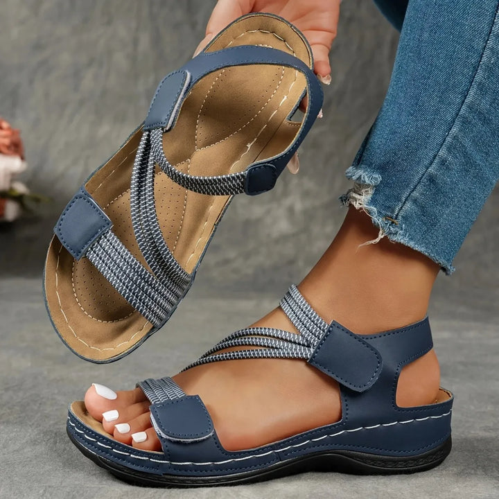 Versatile women's casual sandals with elastic strap & hook-and-loop adjustability for walking comfort.