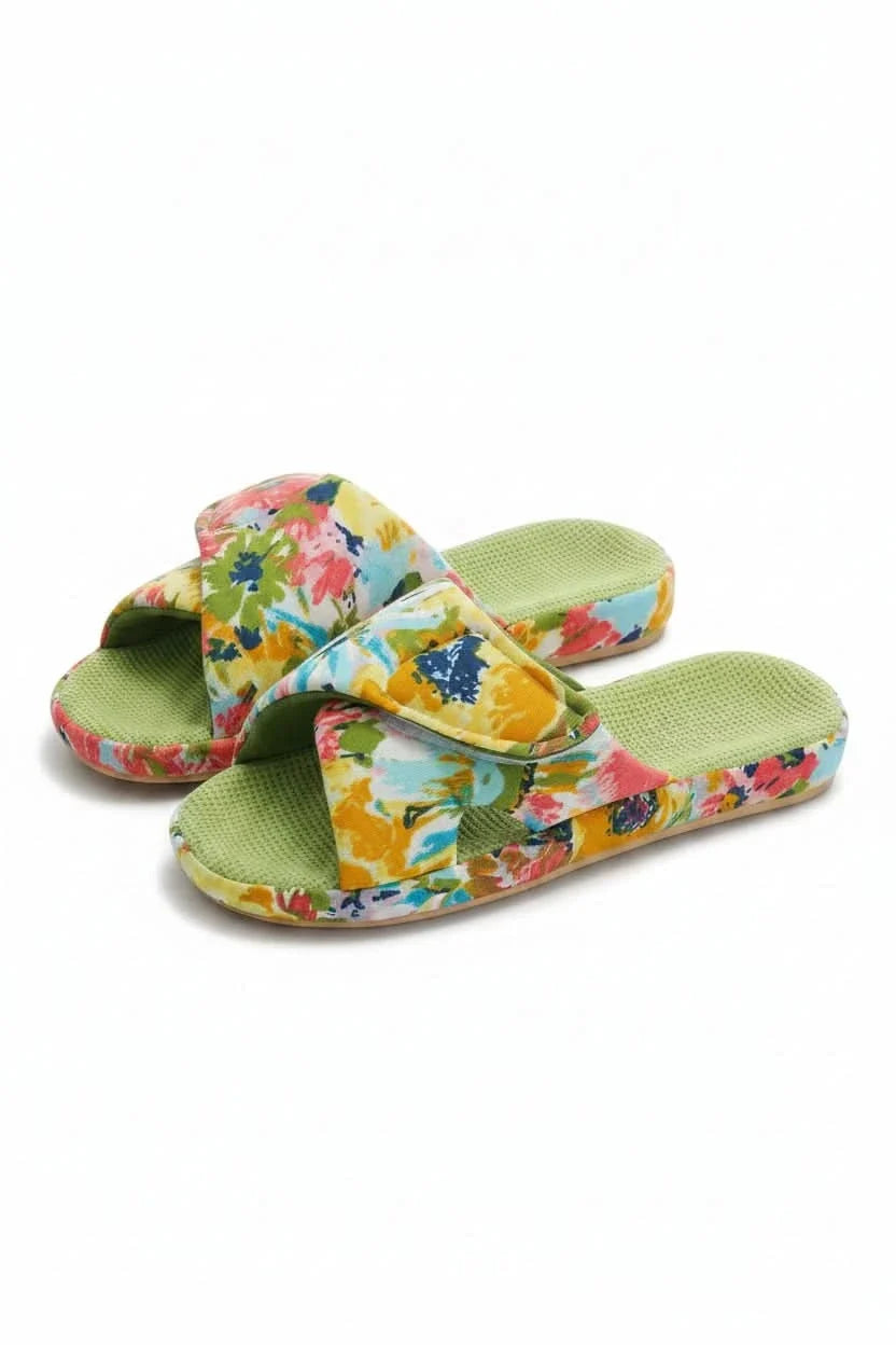 Non-slip sole of women's adjustable open-toe comfort slippers, cushioned for safe indoor use.