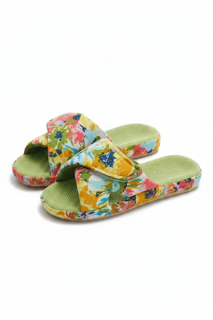 Non-slip sole of women's adjustable open-toe comfort slippers, cushioned for safe indoor use.