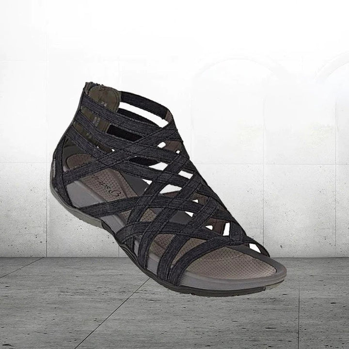Women's open-toe flats with adjustable straps, orthopedic for summer comfort.