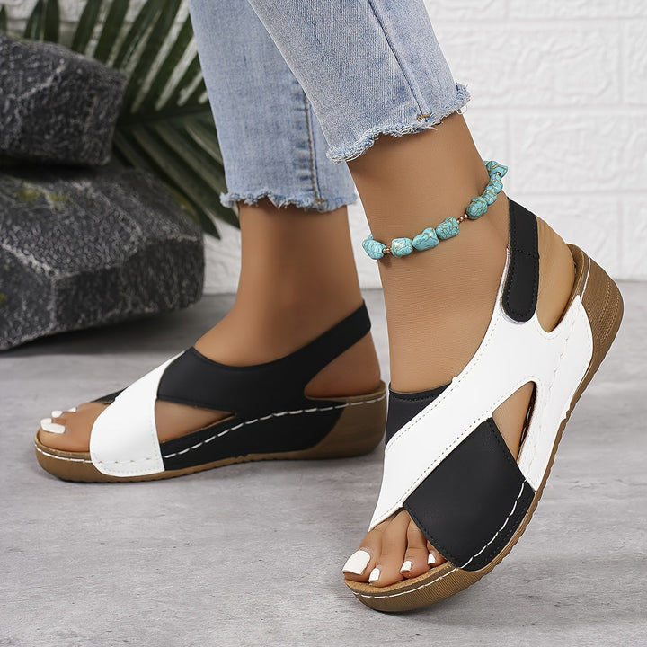 Women's orthopedic sandals promoting foot health with adjustable straps & strong arch support.
