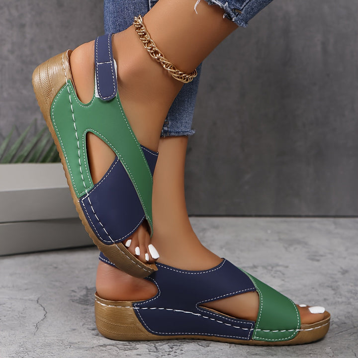 Women's open-toe orthopedic sandals with adjustable straps, arch support for ergonomic comfort.