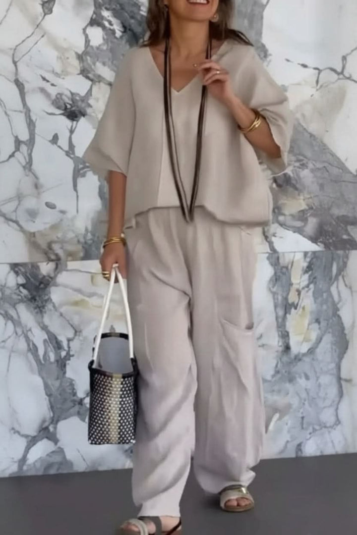 Stylish women's open back pantsuit matching set. Casual chic two-piece outfit for elegant looks.