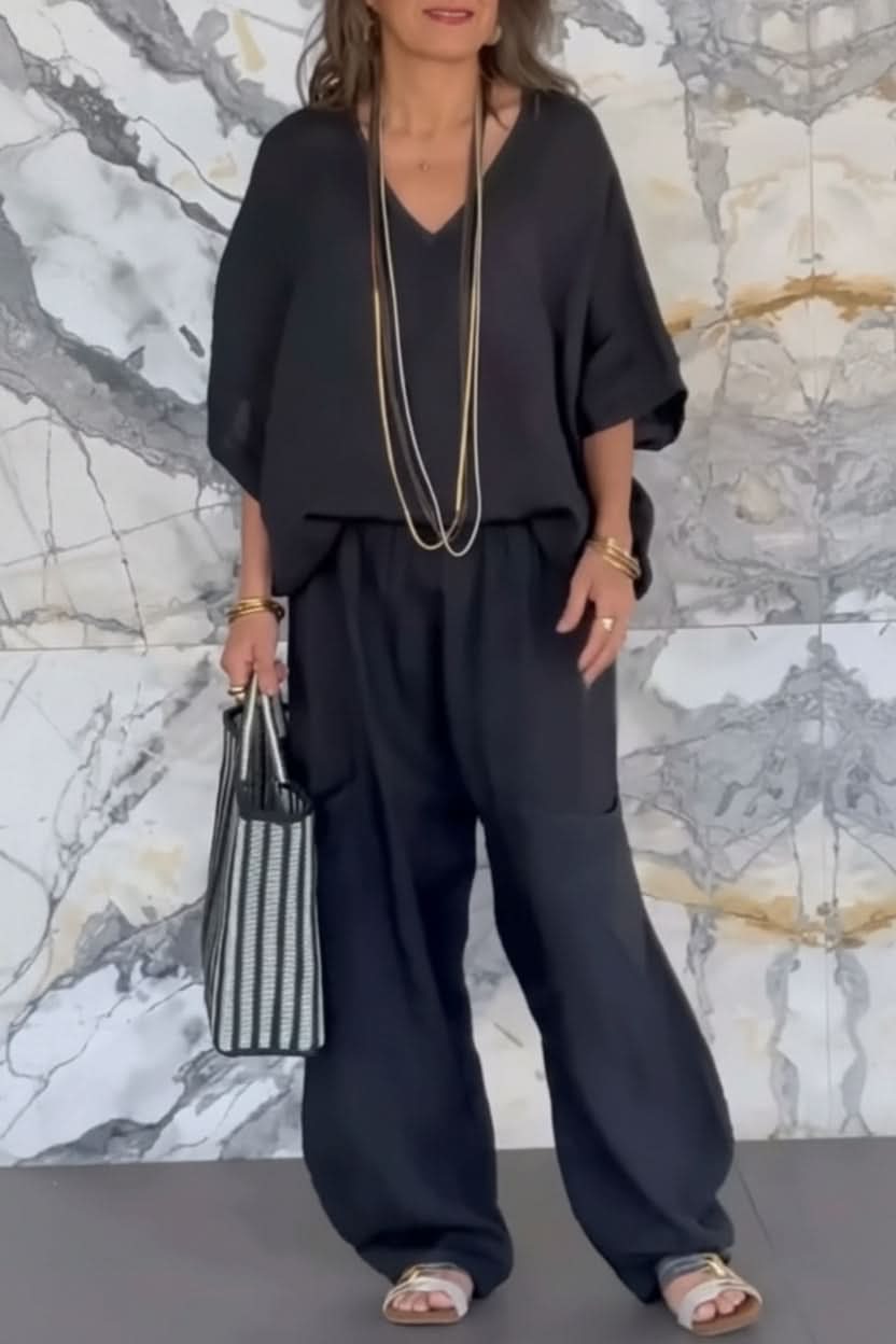Versatile women's open back pantsuit set; ideal travel wear, brunch outfit, or elegant summer look.