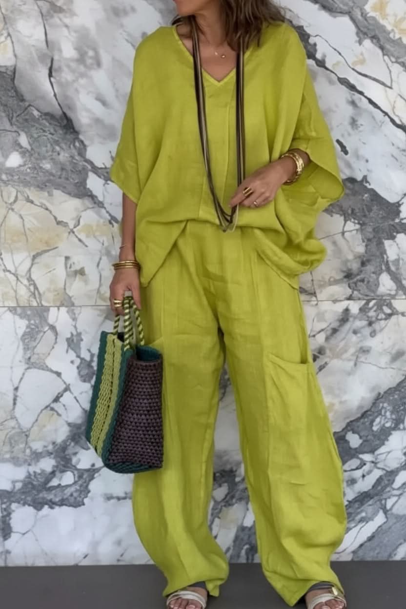 Women's airy open back pantsuit with wide-leg pants. Lightweight, comfortable matching set for summer.