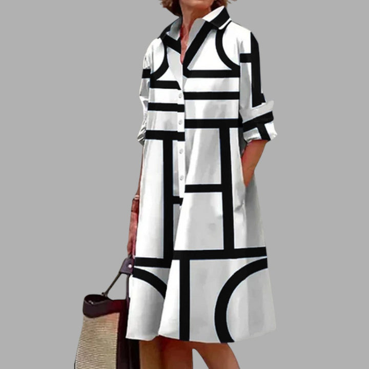 Elegant women's printed midi dress, airy & comfortable for any occasion. Flattering everyday fashion style.