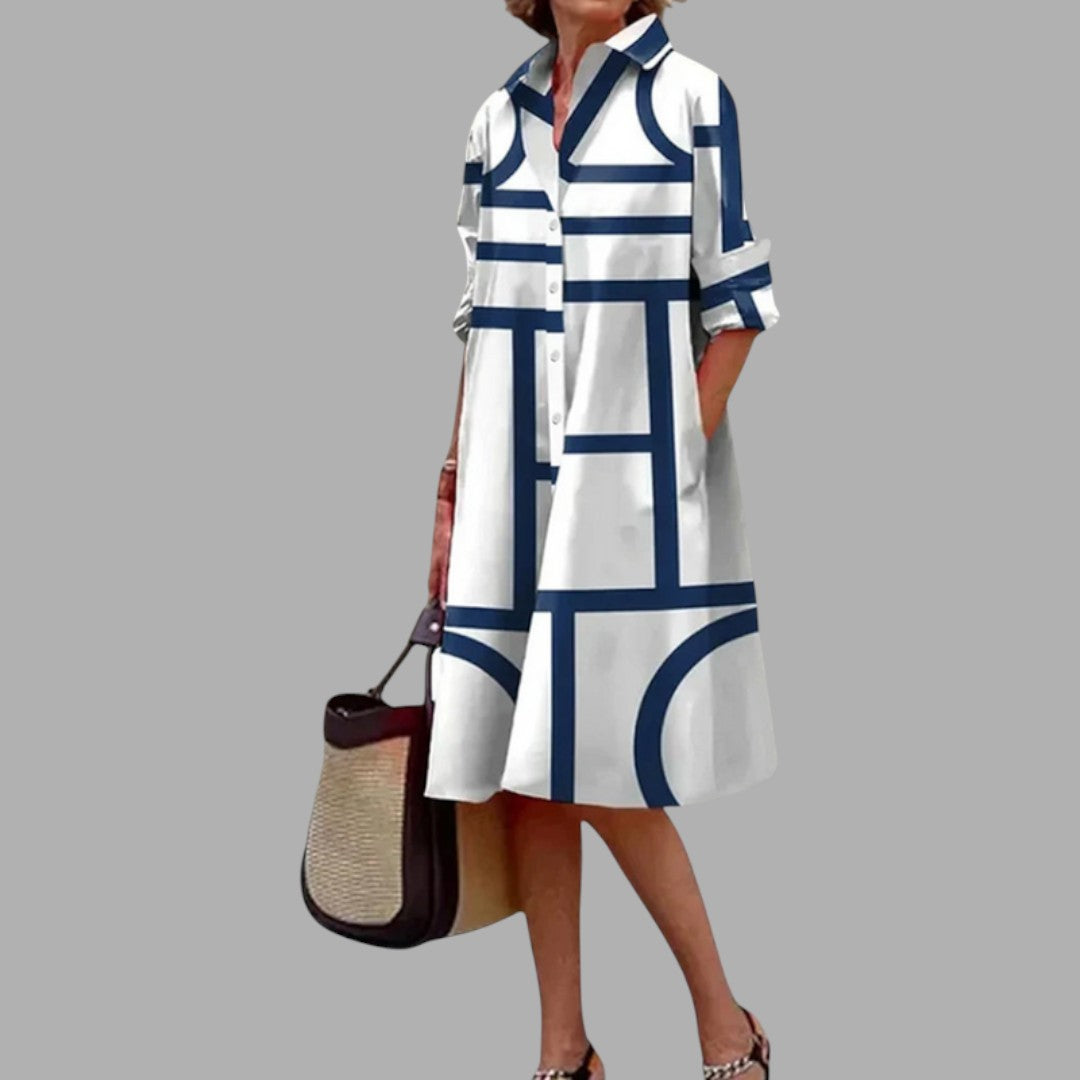 Comfortable women's airy printed midi dress, offering effortless elegance. Flattering summer casual fashion.