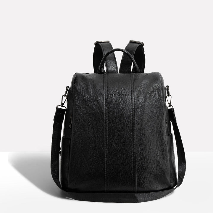 Women's anti-theft convertible backpack, perfect for secure daily commute & travel. Hidden pockets & water-resistant.