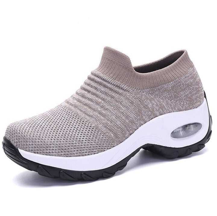 Cushioned women's athletic sneakers with advanced arch support for active daily wear.