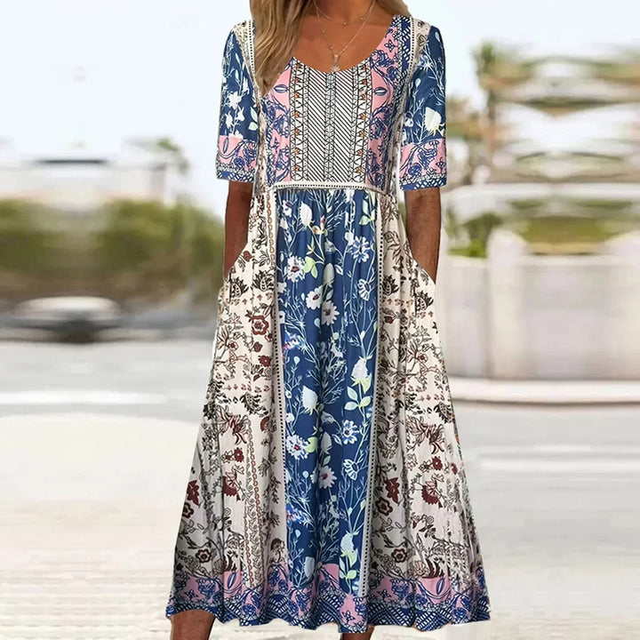 Summer Vacation Women's Midi Dress. Short-sleeve bohemian style with a comfortable round neck & pockets.