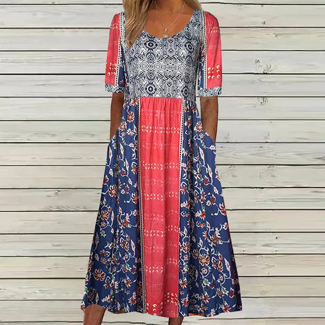 Relaxed fit Women's Floral Midi Dress, artistic bohemian print. Casual short-sleeve design with essential pockets.