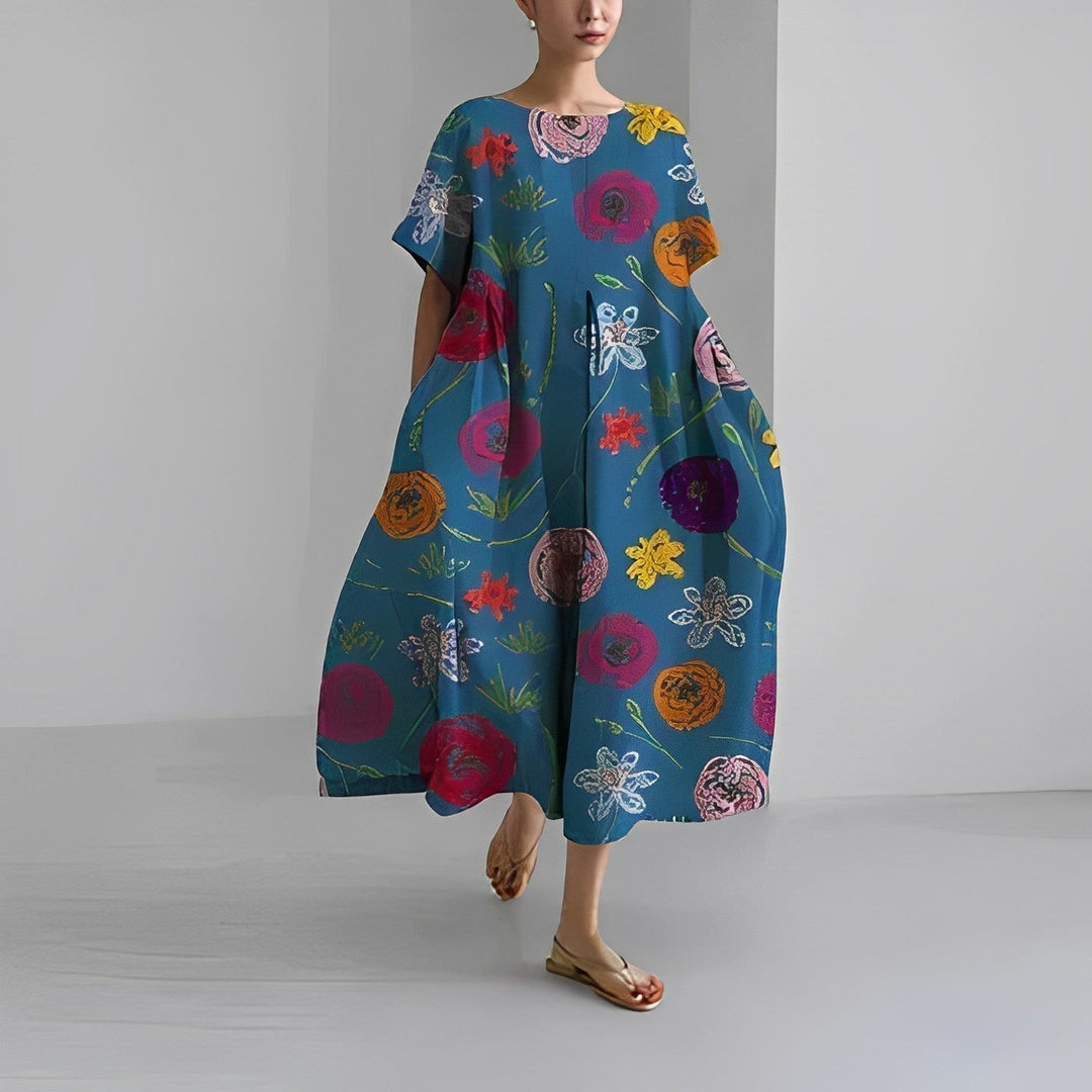 Short sleeve round neck women's midi dress with an artistic print, relaxed fit, and convenient side pockets.