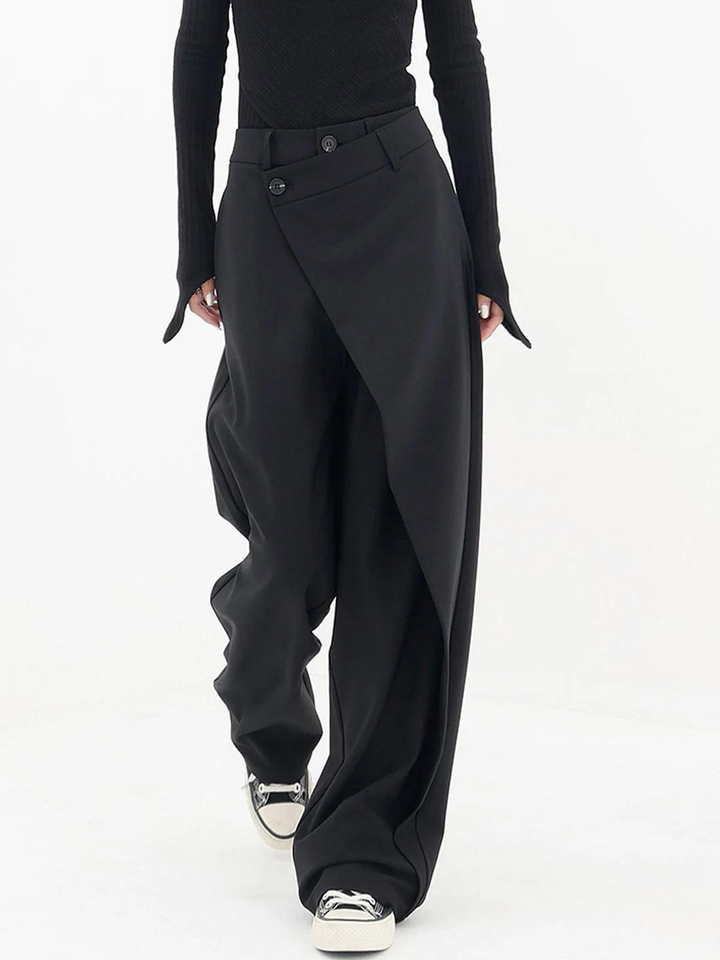 Stylish women's loose fit trousers with unique asymmetric design. Perfect for versatile fashion looks.