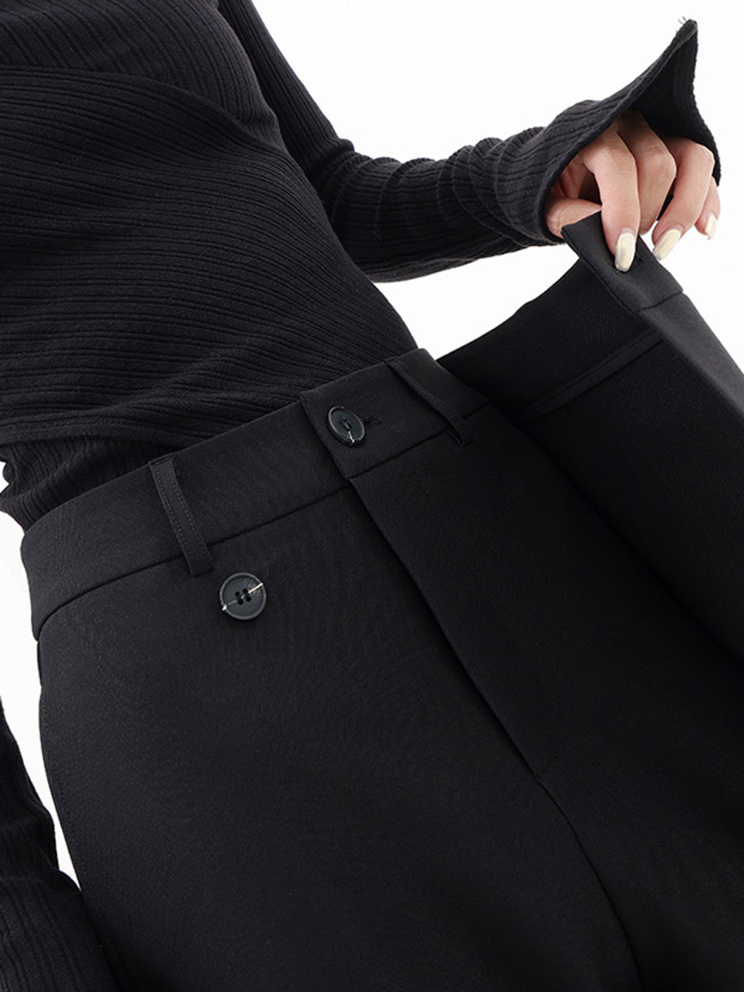 Fashionable women's asymmetric trousers. Versatile baggy pants for a modern, relaxed style.