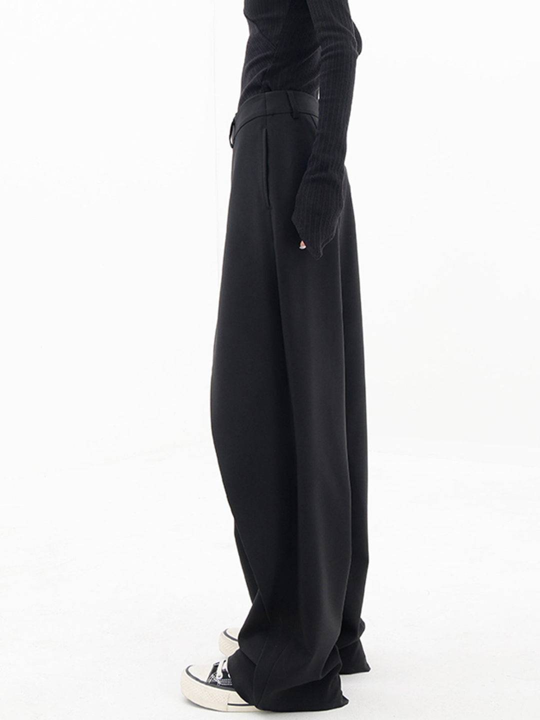 Full shot of women's comfortable relaxed fit baggy trousers. Perfect for modern fashion & comfort.