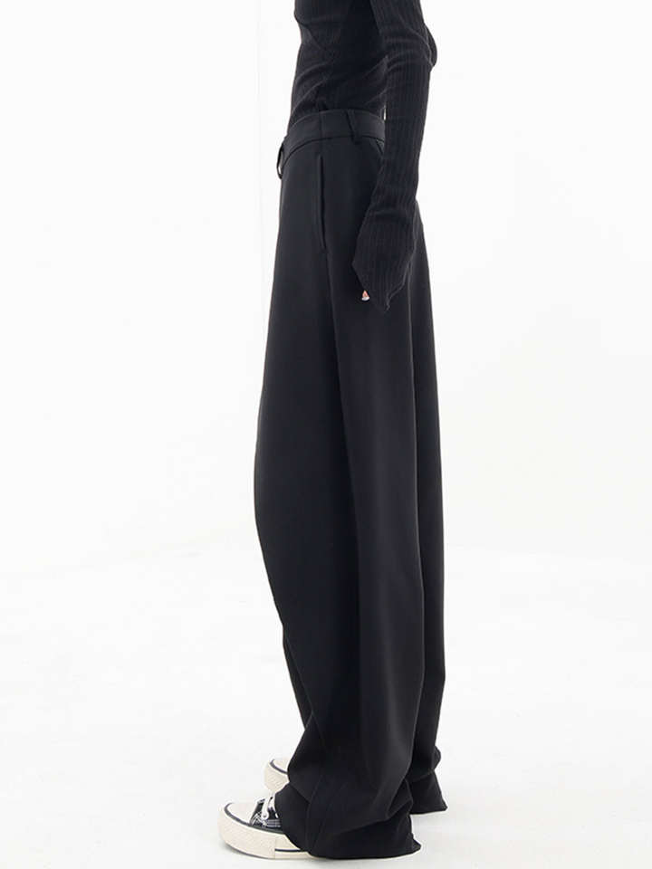 Full shot of women's comfortable relaxed fit baggy trousers. Perfect for modern fashion & comfort.