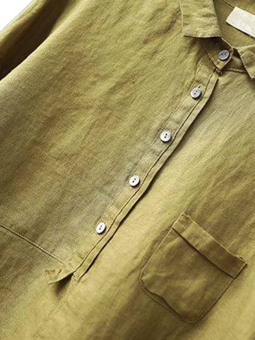 Women's versatile asymmetrical top in a relaxed fit. This long sleeve button-up blouse offers everyday comfort.