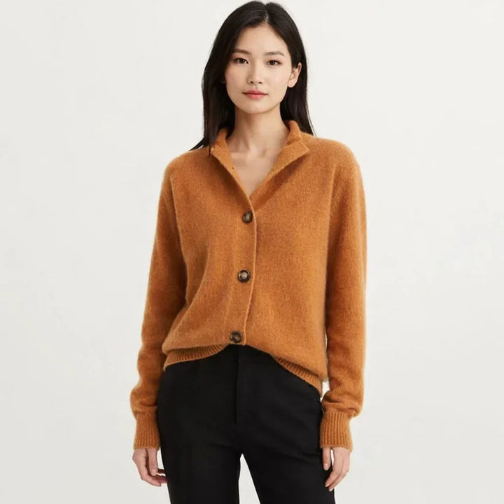 Women's asymmetrical knit cardigan with button placket. Perfect for fall & winter layering, a cozy and warm top.