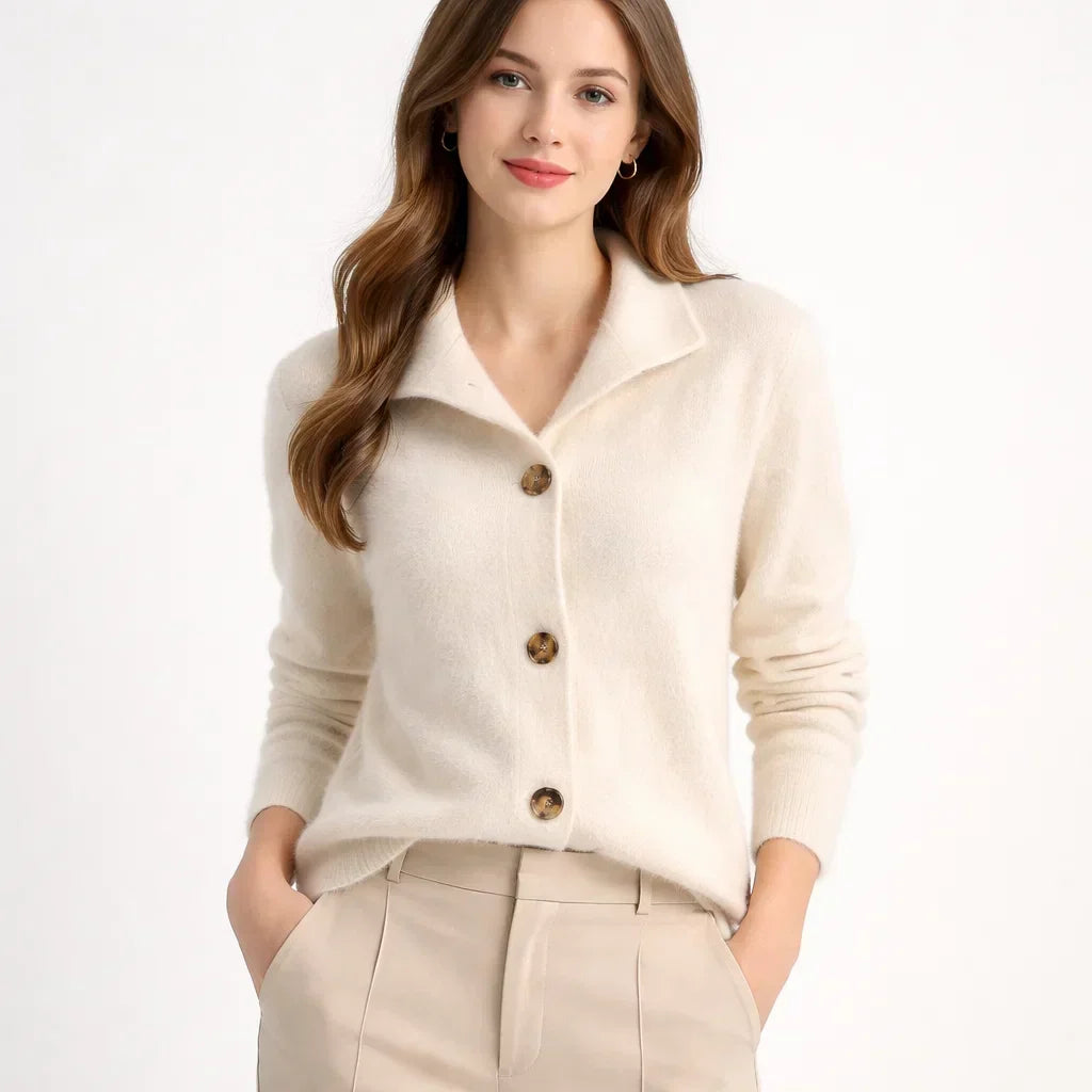 Warm women's knit cardigan with an eye-catching asymmetrical button placket. Great casual top for fall & winter style.