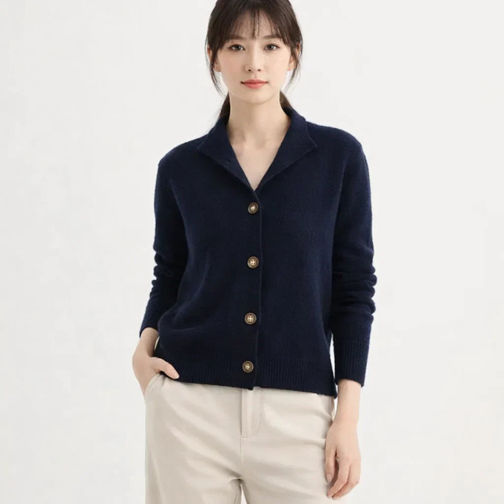 Soft, cozy women's knit cardigan. Asymmetrical buttons add a chic touch. Perfect fall & winter layering piece for comfort.
