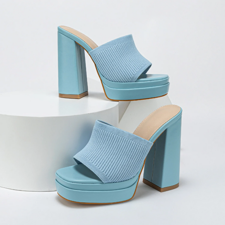 Durable women's platform sandals, featuring adjustable straps for a secure, comfortable fit all day.