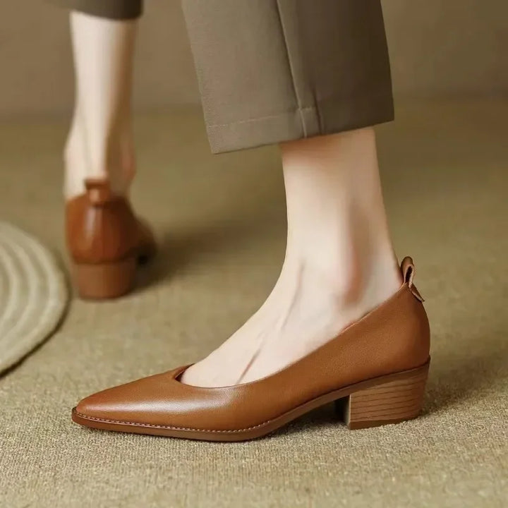 Comfortable women's pointed toe slip-on mid block heel court shoes for all-day wear, stylish & supportive.