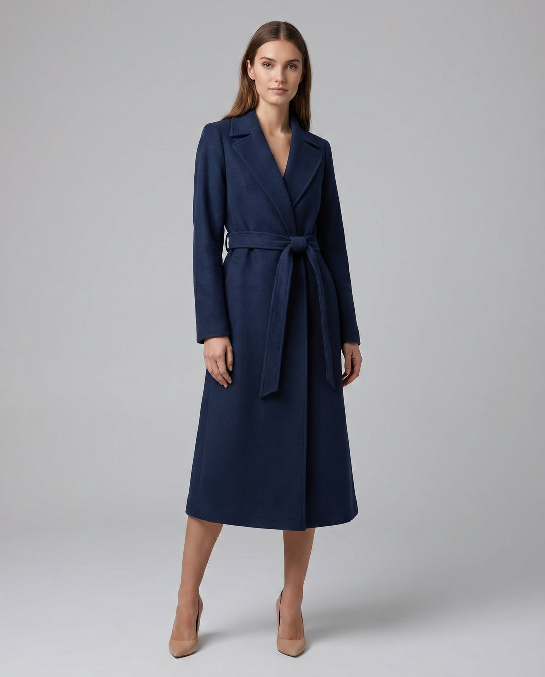 Versatile women's belted trench coat. Structured outerwear, ideal for professional office and chic evening events.