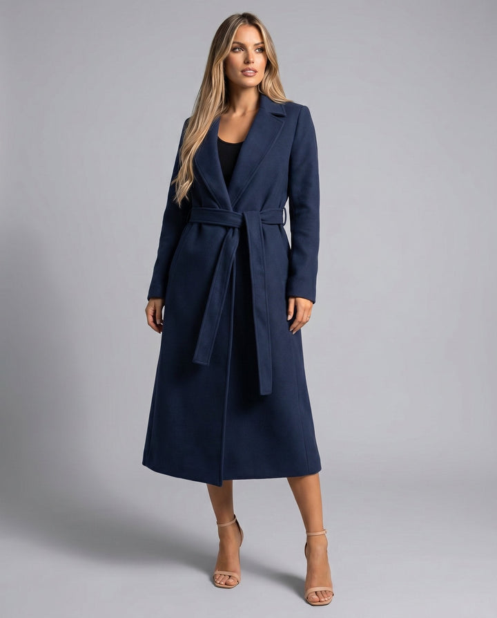 Stylish women's long belted trench coat, a classic structured outerwear piece perfect for elegant fall & winter fashion.