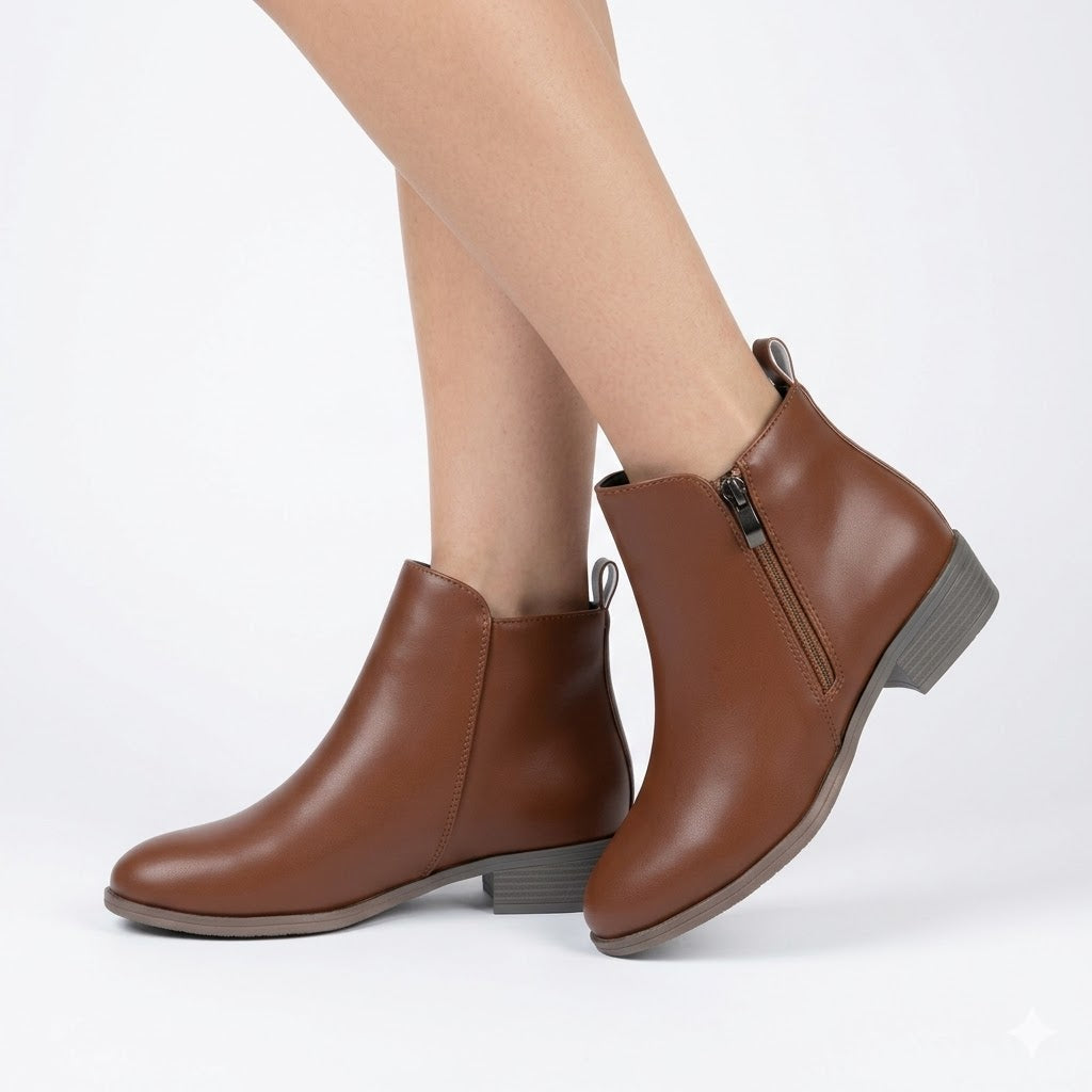 Women's black ankle boots with a stylish block heel & convenient side zip, perfect for casual workwear.
