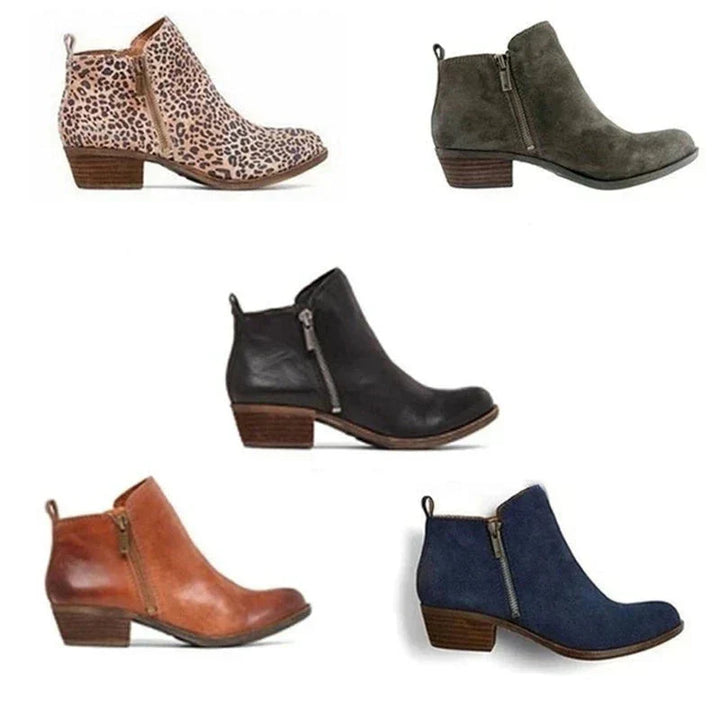 Everyday women's ankle boots with a secure side zip and supportive block heel, great for casual work environments.